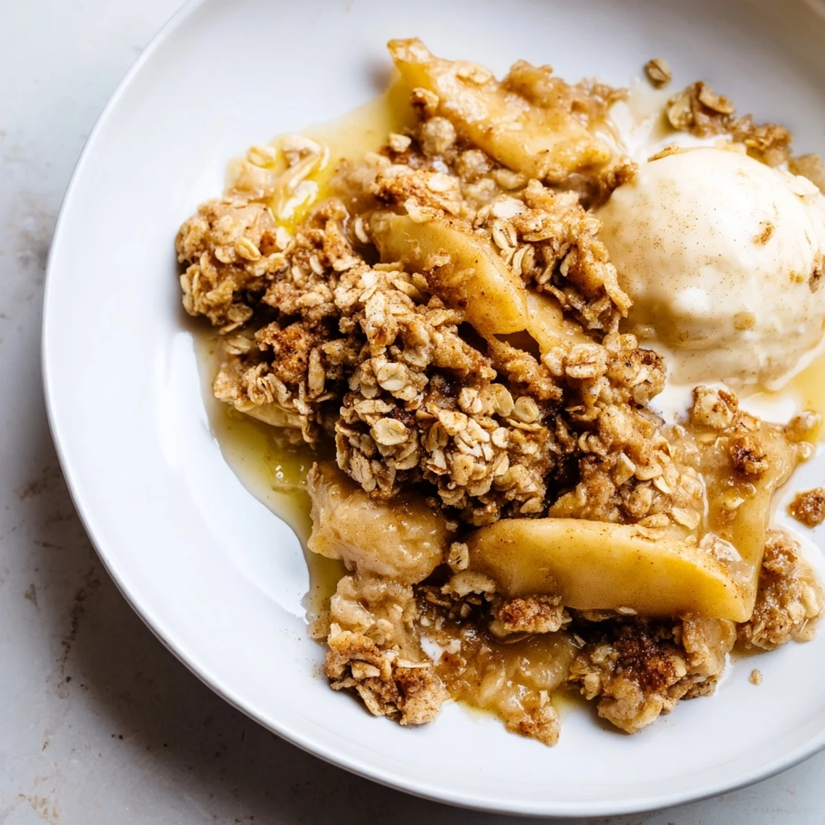 Golden, bubbly spiced apple crisp with a soft crumb topping, perfect for dessert tonight.