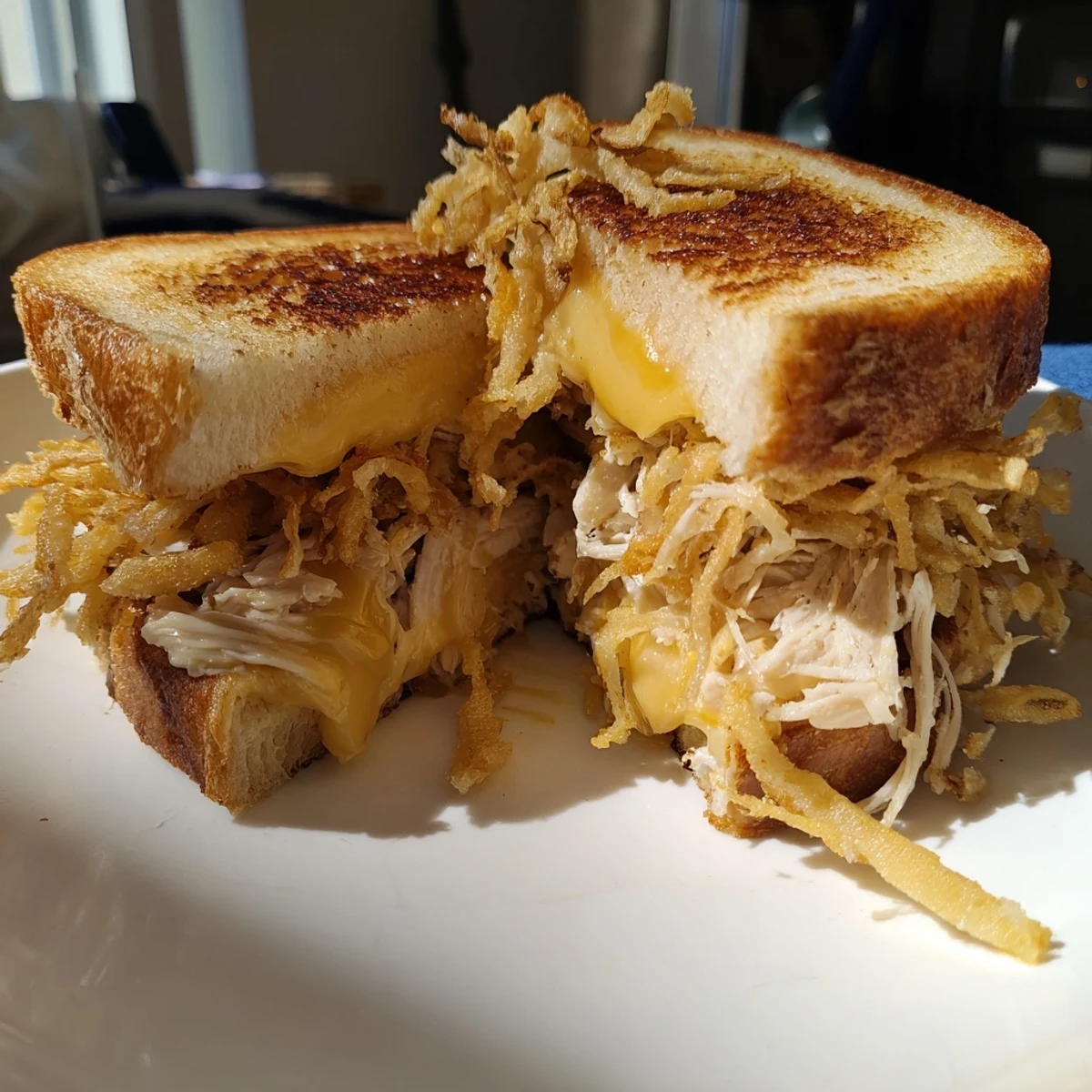 Mouthwatering, golden-brown Crispy Shallot Chicken Grilled Cheese, stacked high with delicious ingredients.
