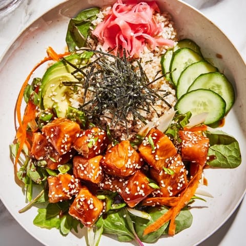 A delicious and healthy poke bowl salad featuring sushi-grade fish, perfect for lunch or dinner.