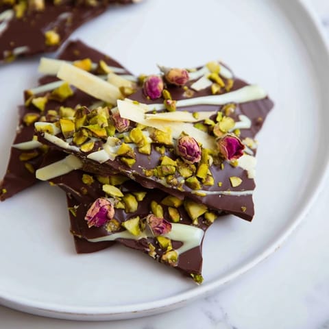 Savor the visual of this rich Pistachio Dubai Chocolate Bark, ready to be broken into delightful pieces.