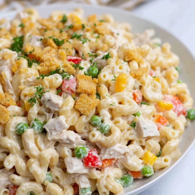 Creamy Chicken Macaroni Southern Style, filled with shredded chicken and colorful veggies, ready to serve and enjoy.